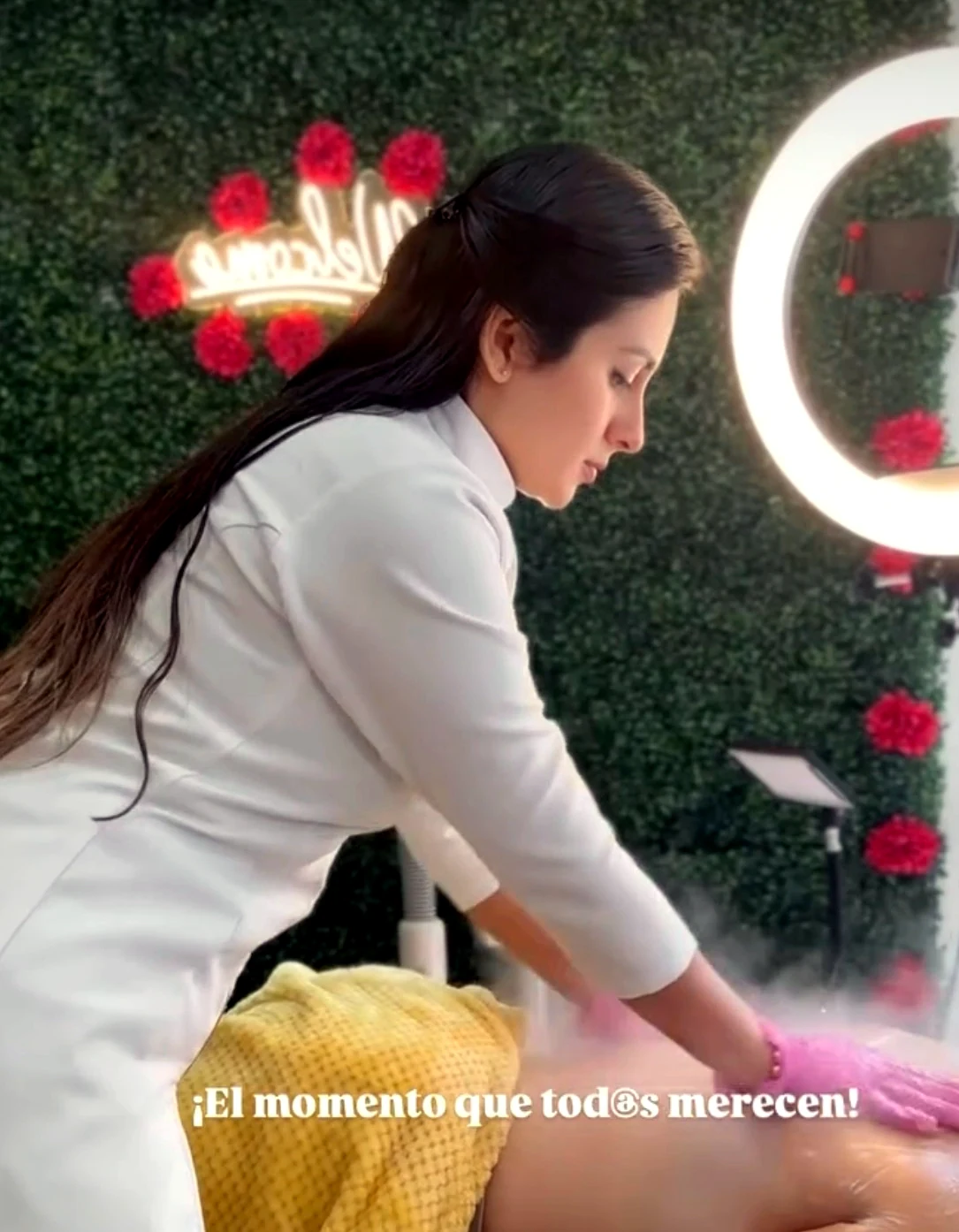 Emily performing a relaxing body treatment in a spa setting.